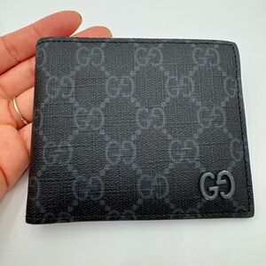 Black Gucci Monogram Leather Wallet with olive green interior